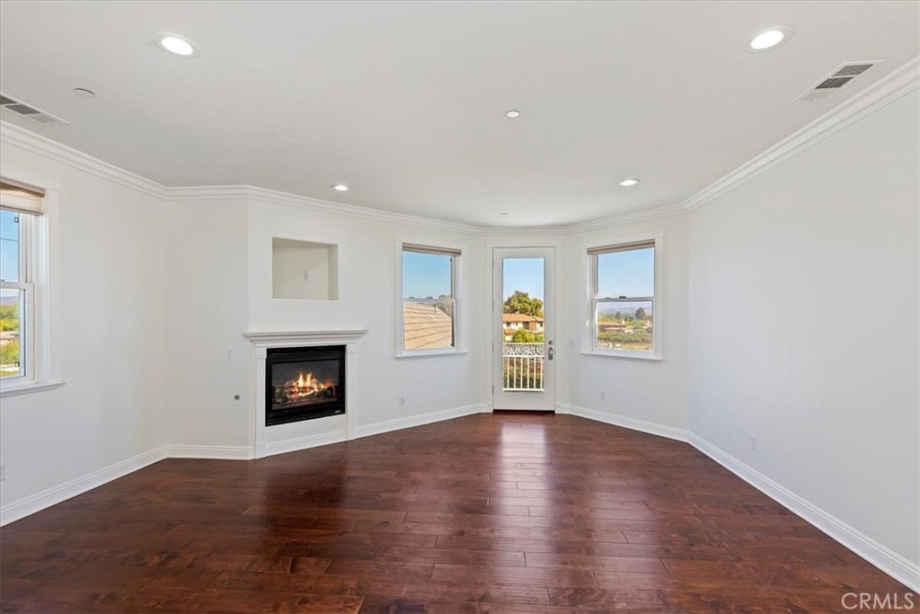 39650 Patagonia Court Temecula, CA 92591 - Photo 20 of 55 an empty room with windows and fireplace