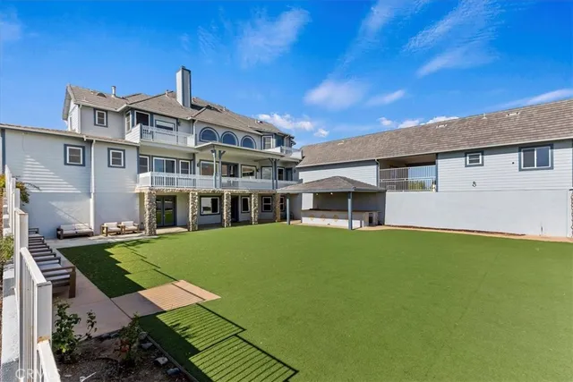 a view of a house with a swimming pool