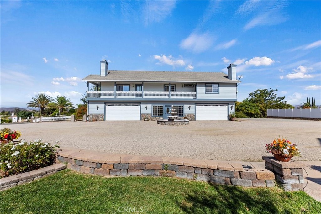 39650 Patagonia Court Temecula, CA 92591 - Photo 33 of 55 an aerial view of a house with garden space and a patio