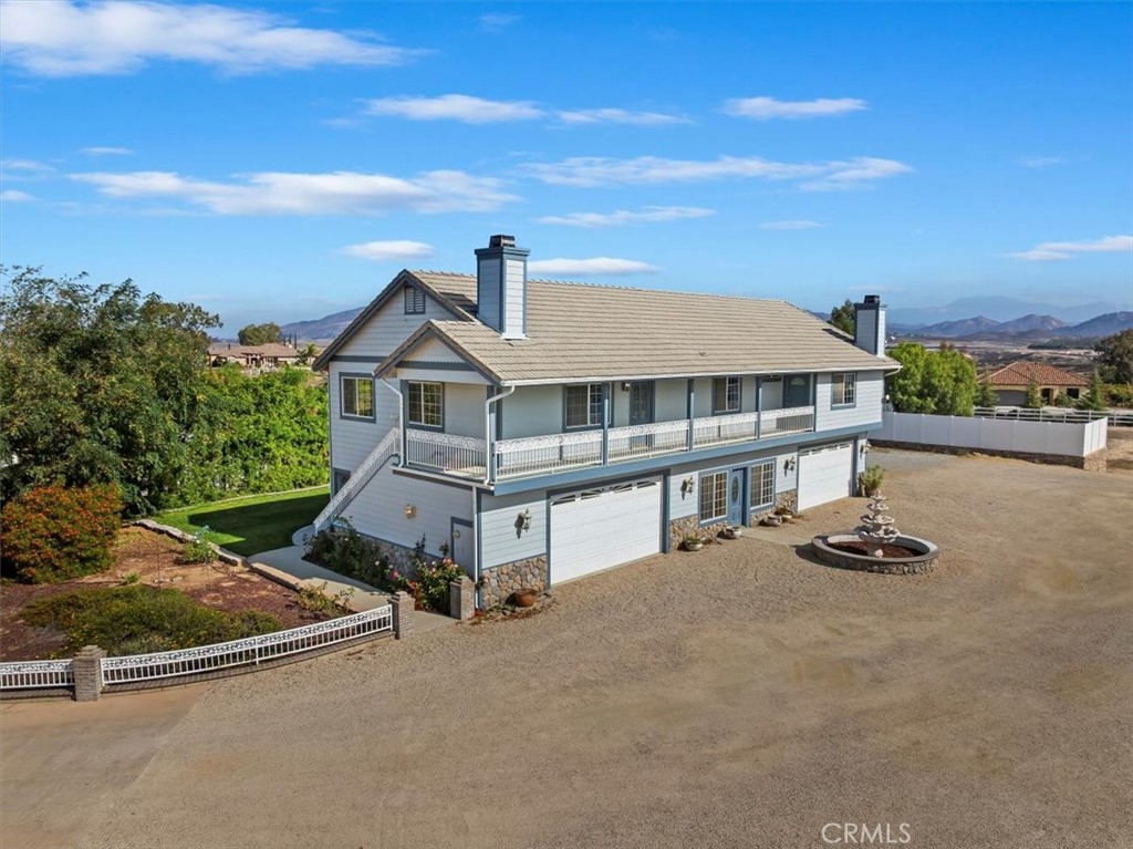 39650 Patagonia Court Temecula, CA 92591 - Photo 34 of 55 a view of a white house with a ocean view