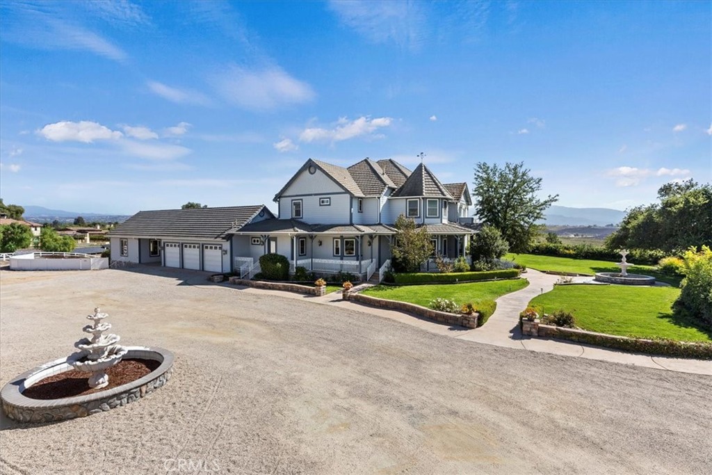39650 Patagonia Court Temecula, CA 92591 - Photo 49 of 55 a front view of a house with garden