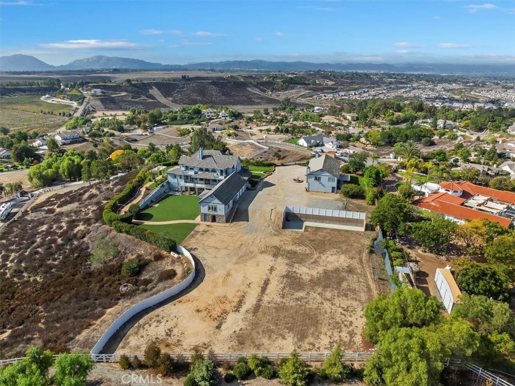 39650 Patagonia Court Temecula, CA 92591 - Photo 55 of 55 an aerial view of a house with a yard and lake view