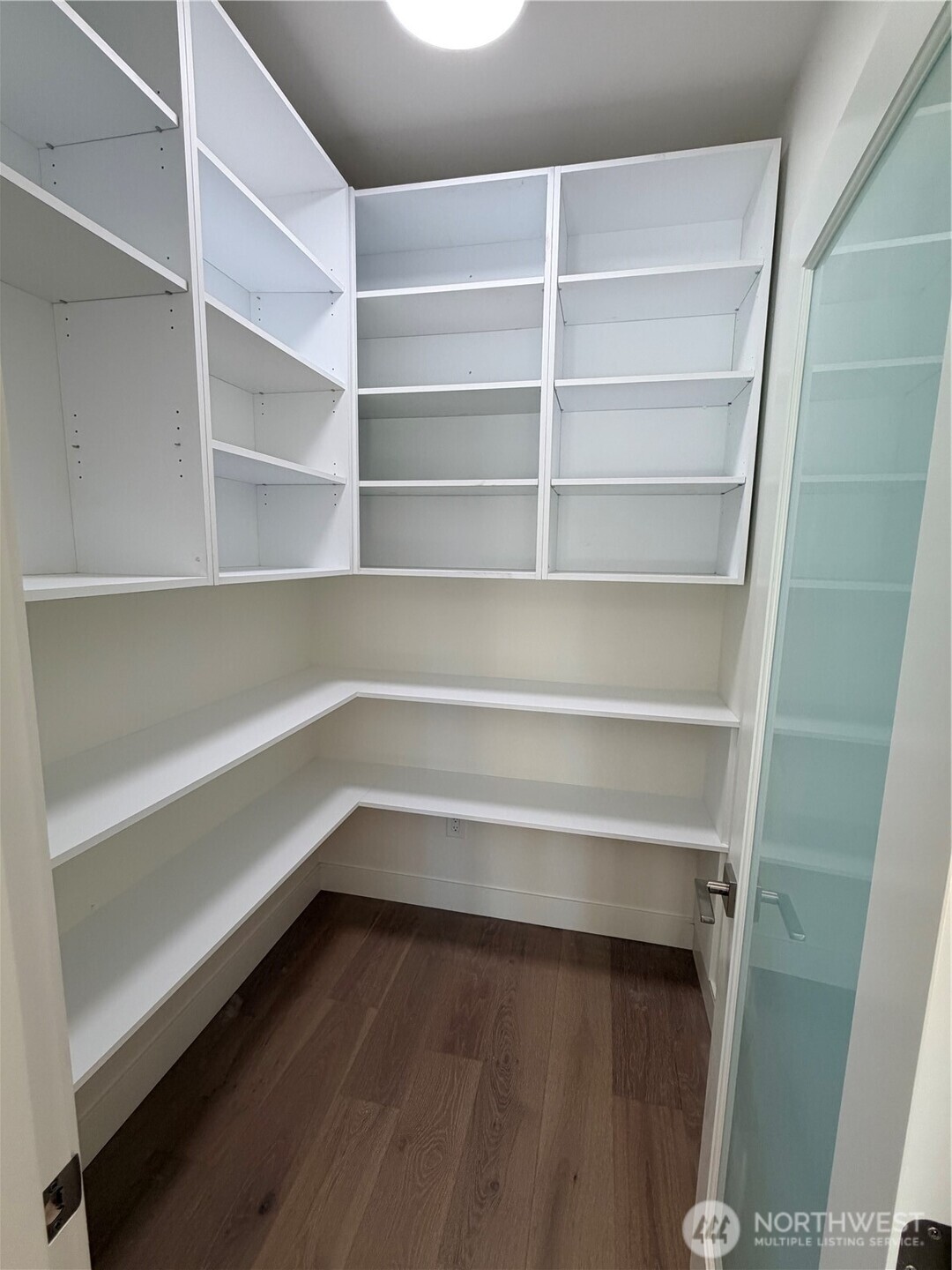 4305 Northeast 26th Court Renton, WA 98059 - Photo 10 of 40 a view of walk in closet with empty racks