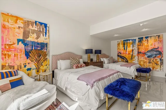 a bedroom with a bed and a window with balcony view