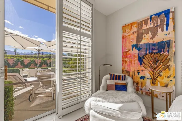 a sink with a mirror and vanity