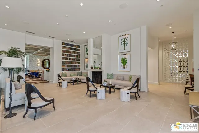 a view of a park with couches in the patio