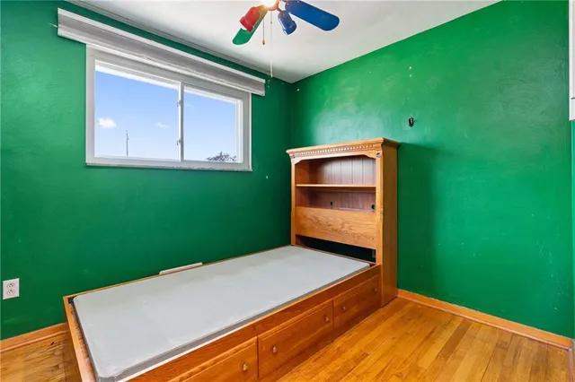 a room with window and cabinet