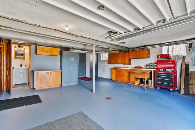 an empty room with an empty space and furniture