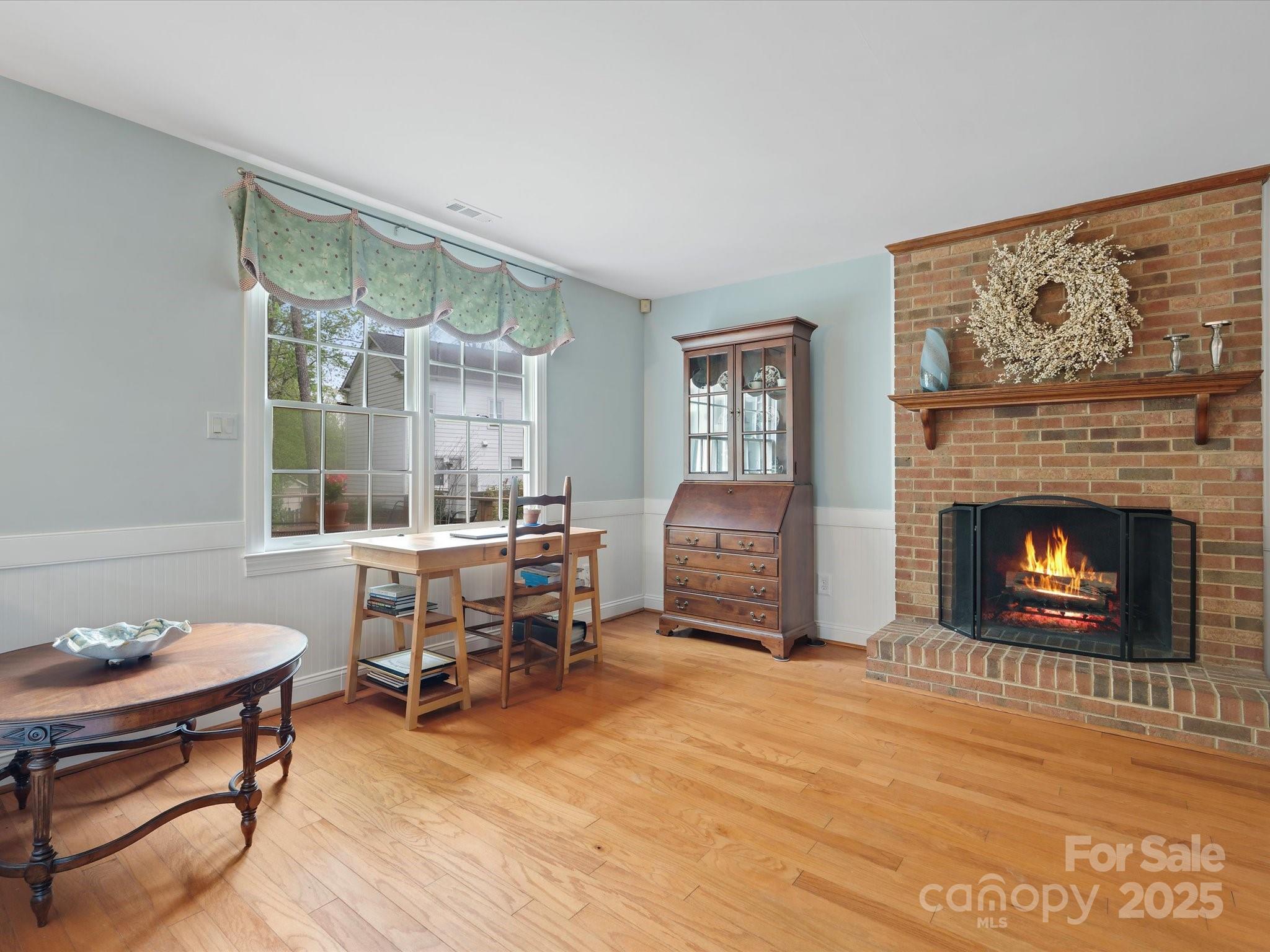 2812 Edgebrook Circle Matthews, NC 28105 - Photo 14 of 46 a living room with furniture a window and a fireplace