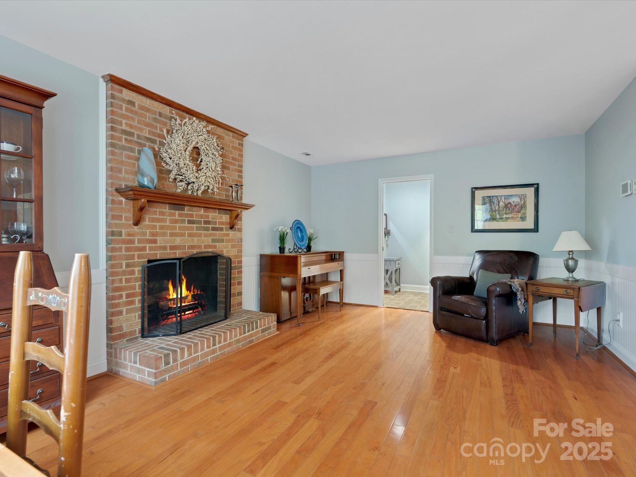 2812 Edgebrook Circle Matthews, NC 28105 - Photo 16 of 46 a living room with furniture and a fireplace