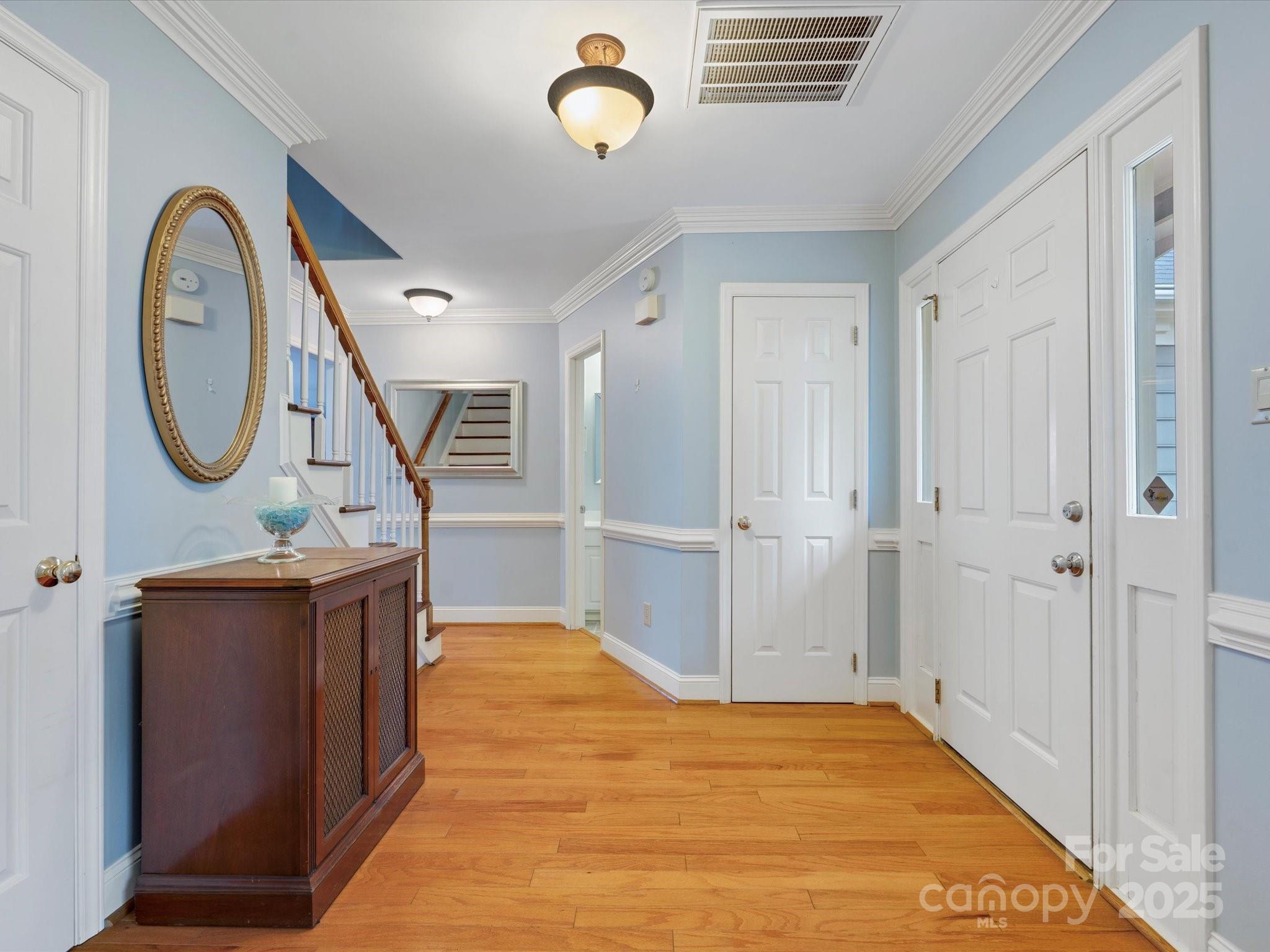 2812 Edgebrook Circle Matthews, NC 28105 - Photo 19 of 46 a view of a livingroom with furniture kitchen wooden floor and window