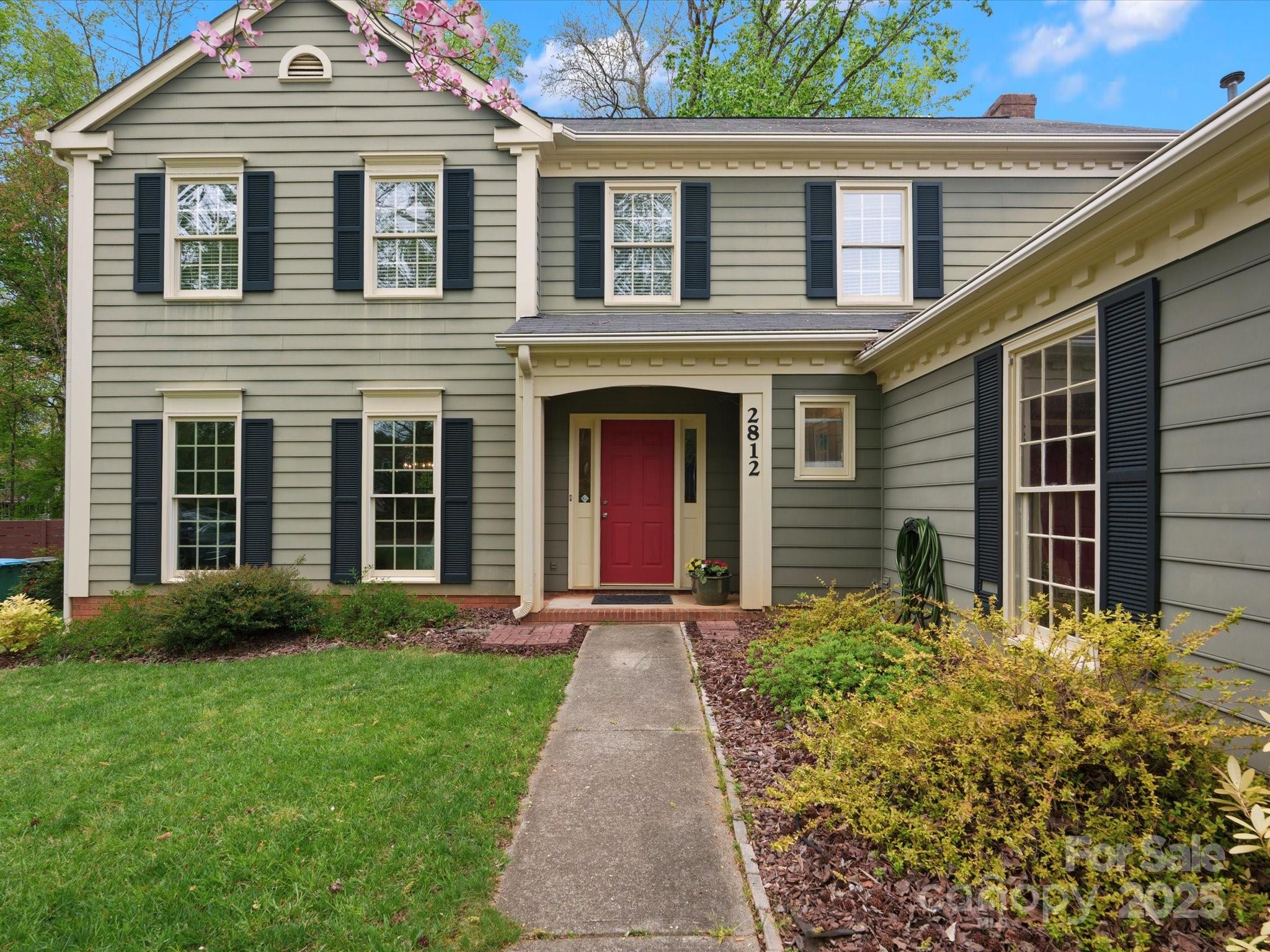 2812 Edgebrook Circle Matthews, NC 28105 - Photo 2 of 46 front view of a house with a yard