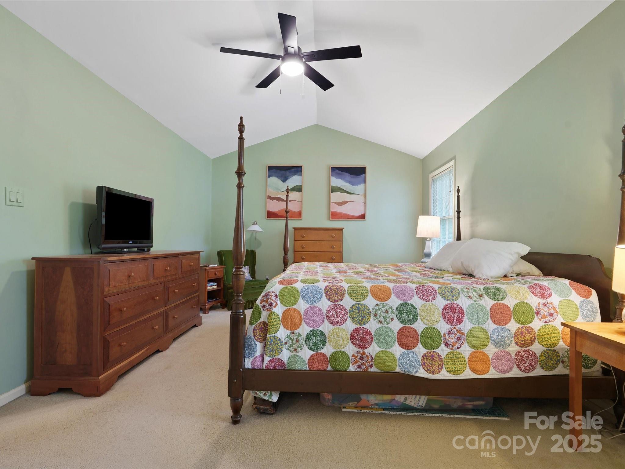 2812 Edgebrook Circle Matthews, NC 28105 - Photo 22 of 46 a bedroom with a bed and dresser with mirror