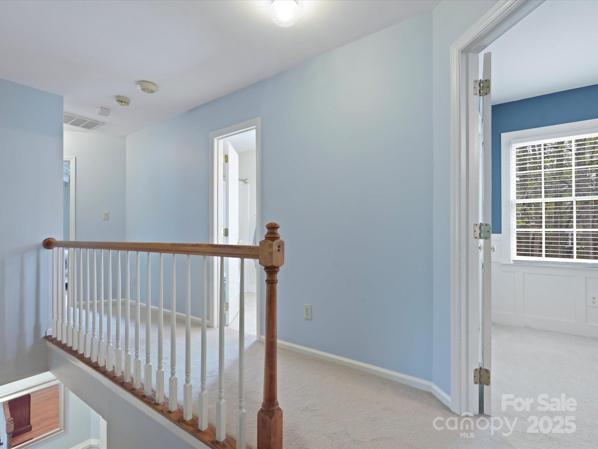 2812 Edgebrook Circle Matthews, NC 28105 - Photo 26 of 46 a view of a hallway with windows