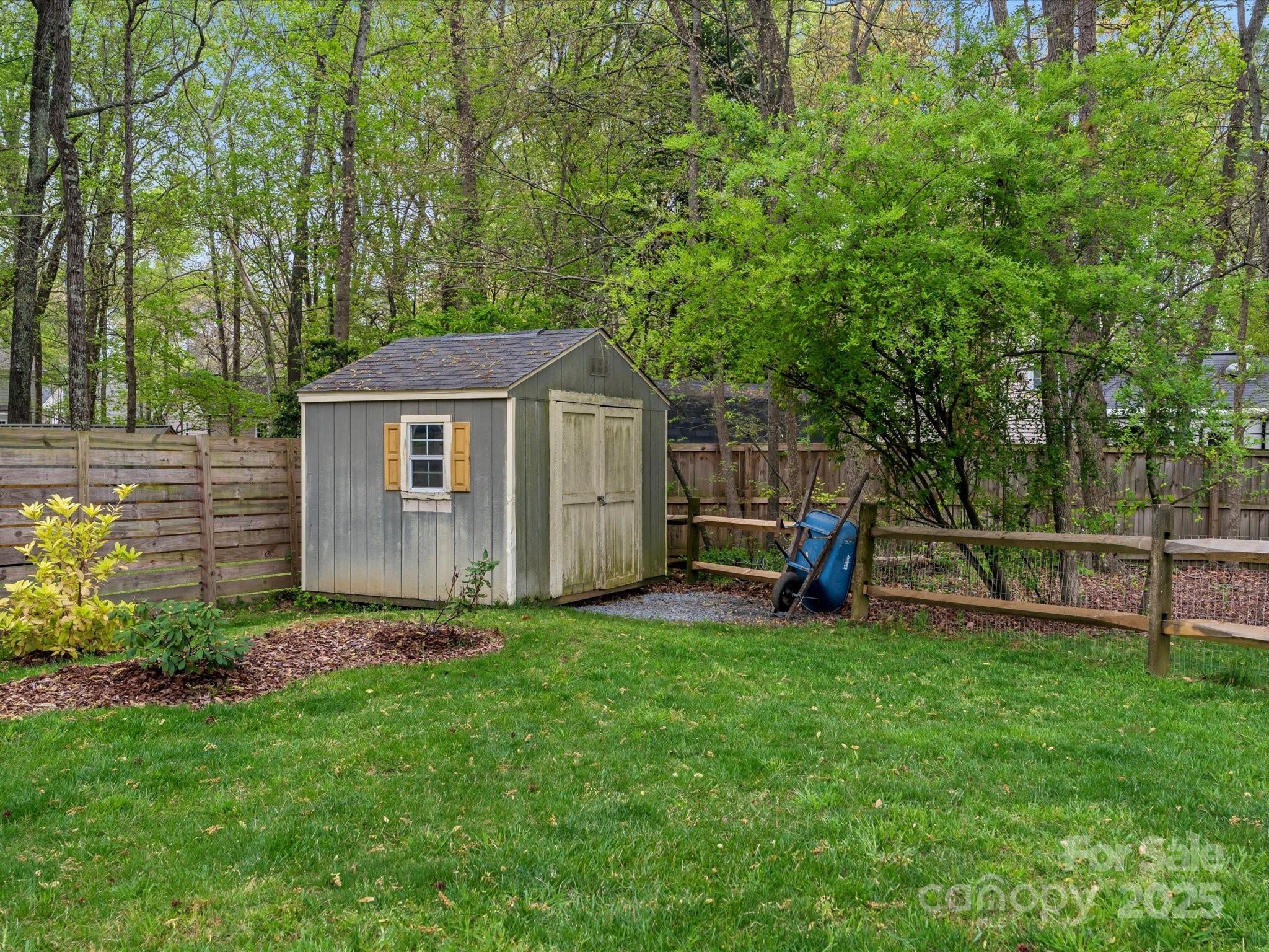2812 Edgebrook Circle Matthews, NC 28105 - Photo 42 of 46 a view of a house with a yard and sitting area