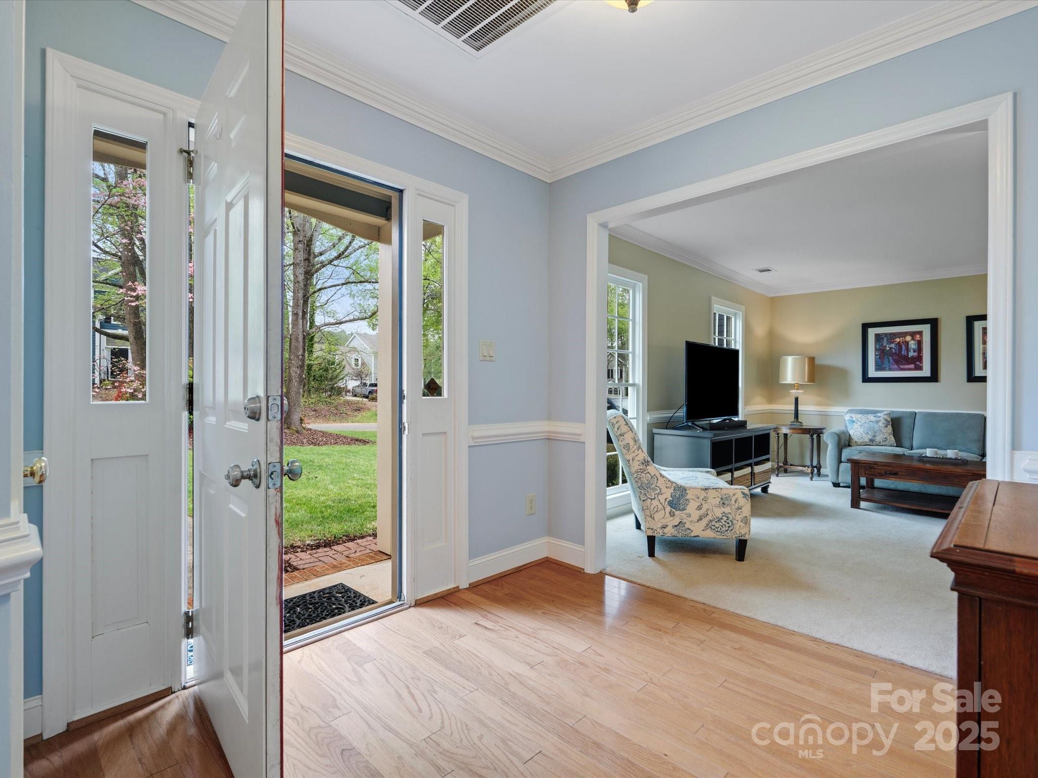 2812 Edgebrook Circle Matthews, NC 28105 - Photo 5 of 46 a living room with furniture and a flat screen tv