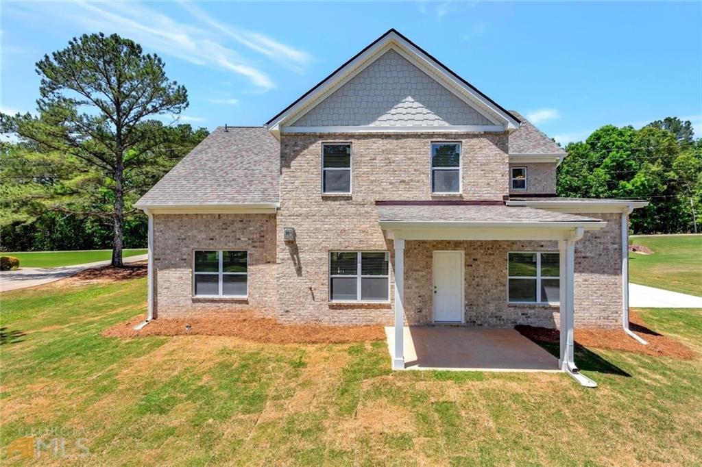 860 North Bethany Road McDonough, GA 30252 - Photo 56 of 57 a front view of a house with a yard