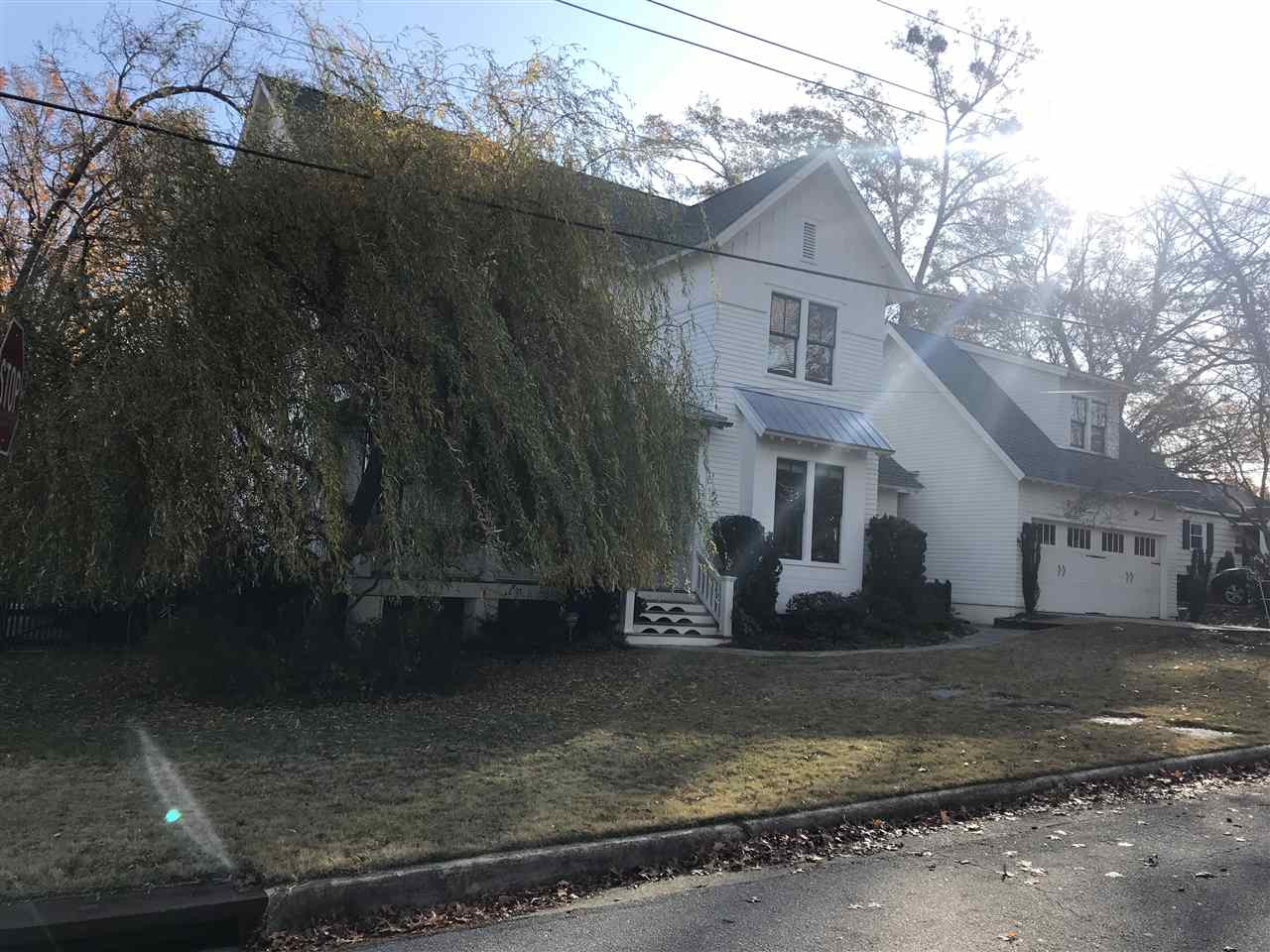 2100 Wiggs Street Raleigh, NC 27608 - Photo 2 of 3 a front view of a house with a yard