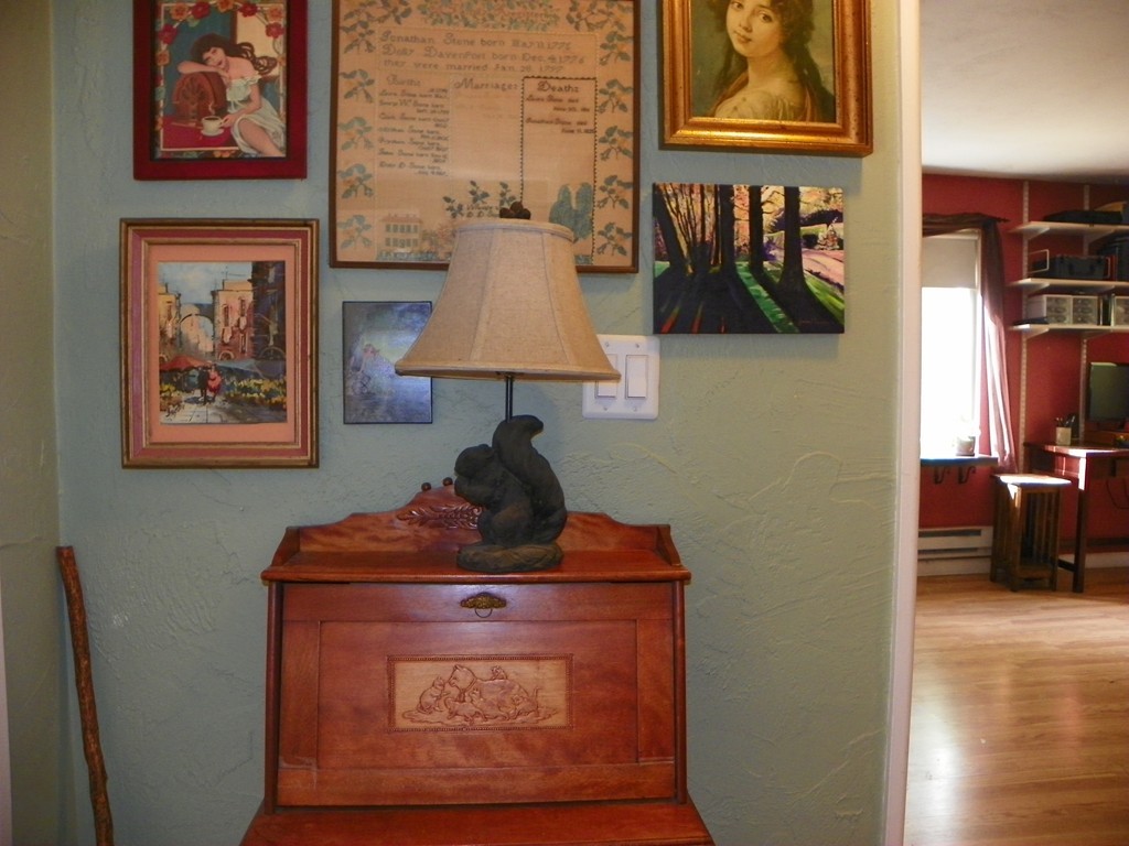 288 Swanson Road, Unit 206 Boxborough, MA 01719 - Photo 4 of 11 a room with furniture and paintings on the wall