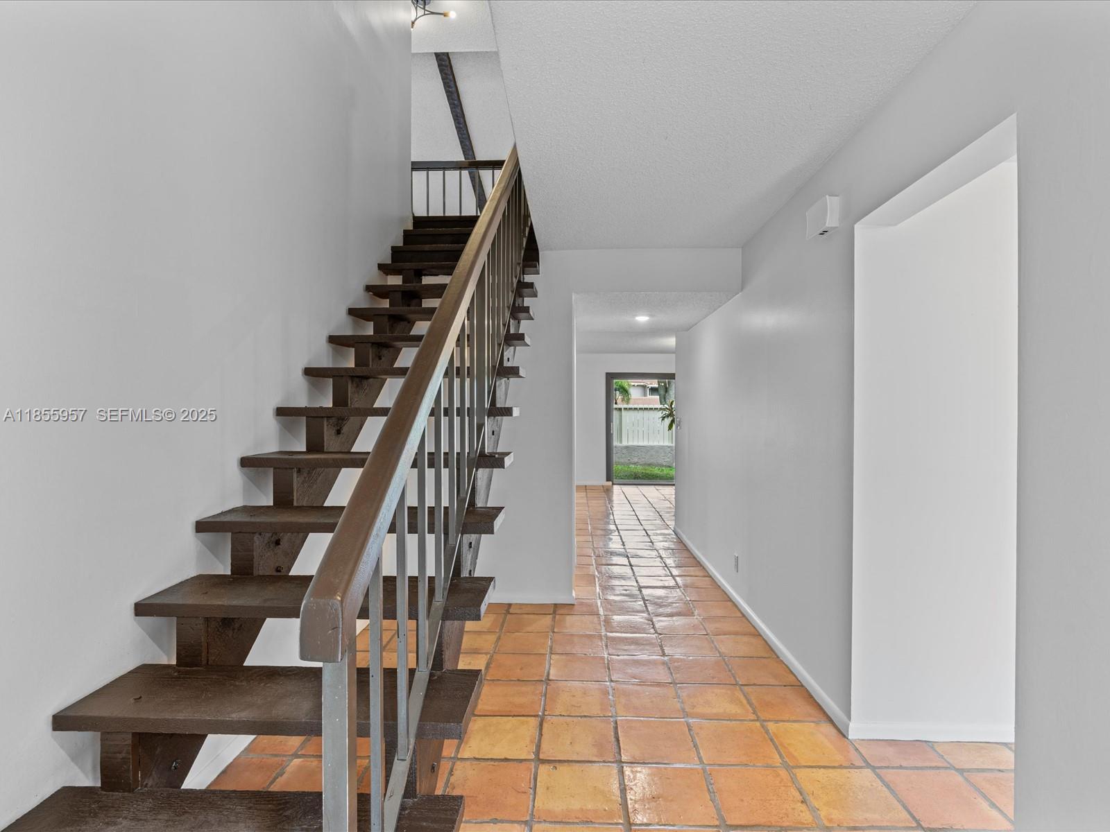 203 Bonnie Brae Way, Unit 34 Hollywood, FL 33021 - Photo 16 of 41 a view of entryway with wooden floor