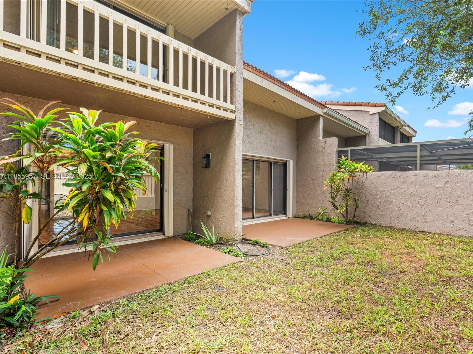 203 Bonnie Brae Way, Unit 34 Hollywood, FL 33021 - Photo 37 of 41 a view of a house with a patio