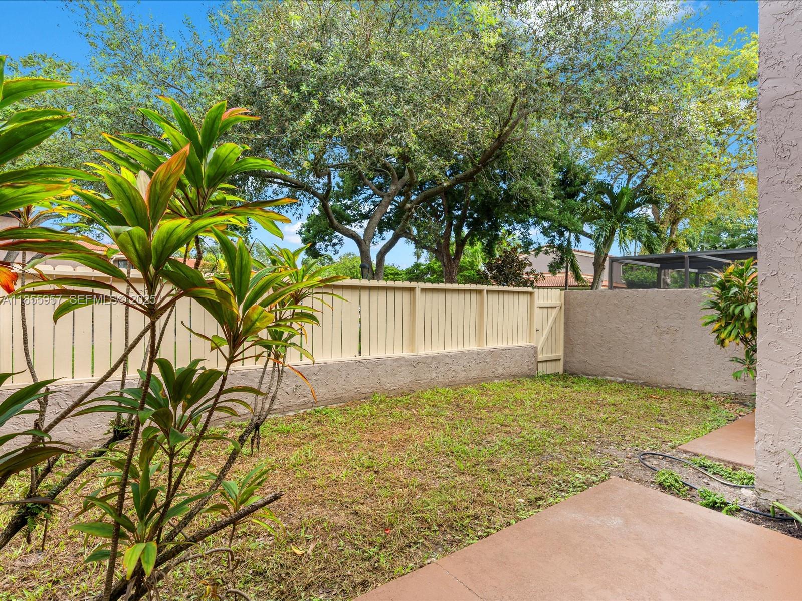 203 Bonnie Brae Way, Unit 34 Hollywood, FL 33021 - Photo 38 of 41 a view of backyard with tree