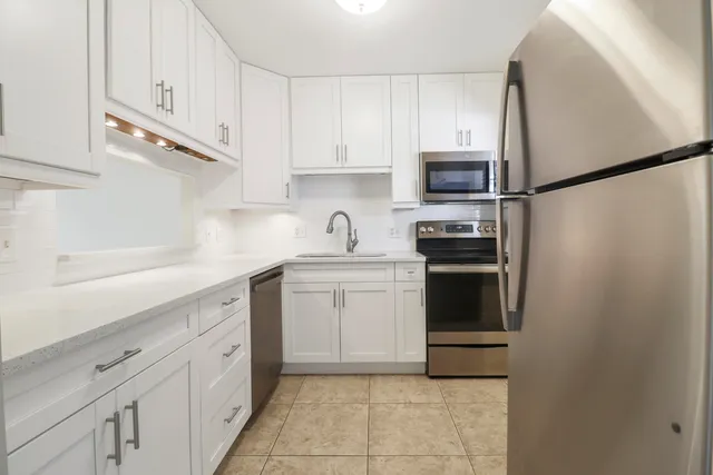 a view of a building with a big yard