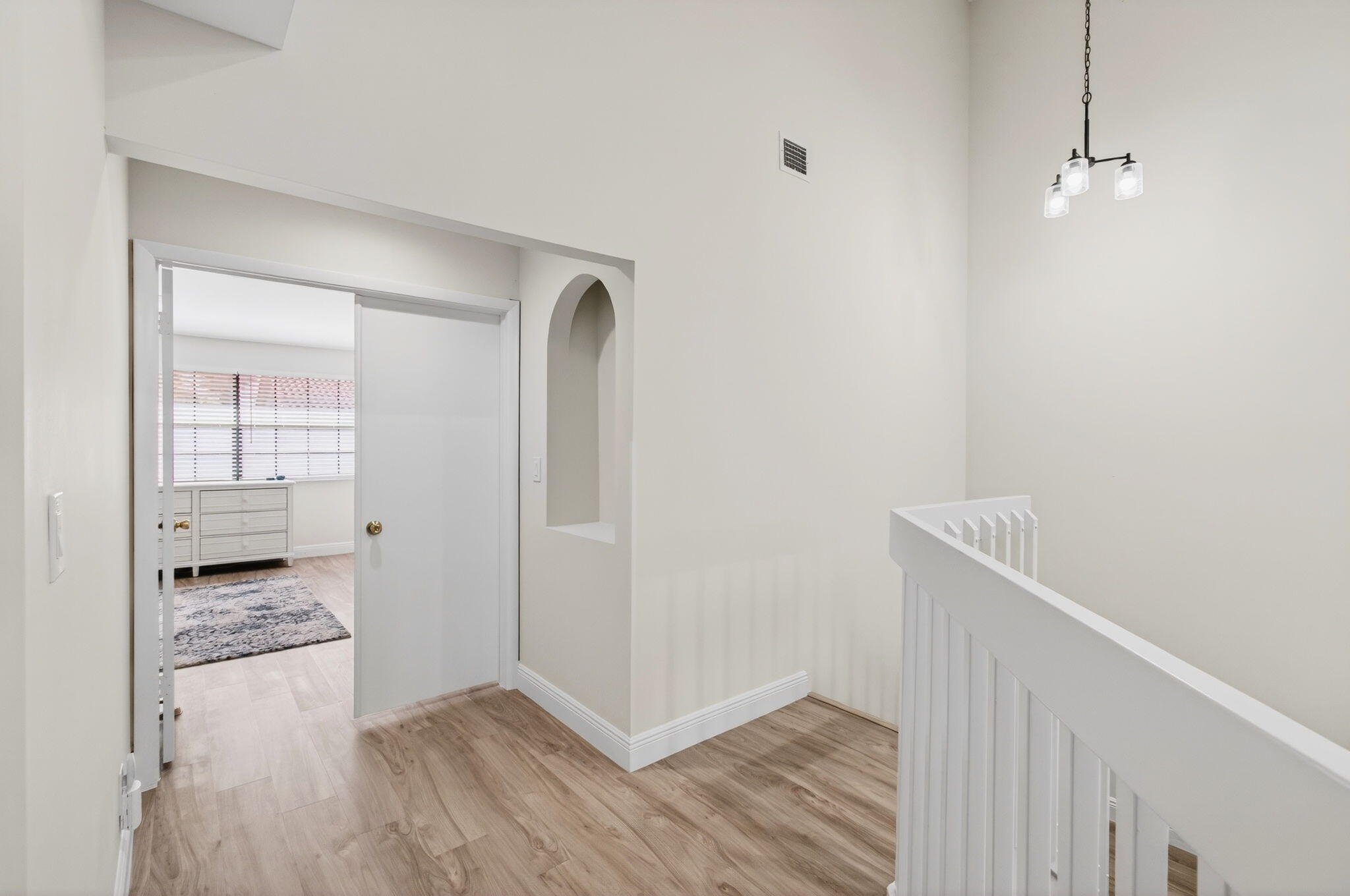 7727 La Mirada Drive Boca Raton, FL 33433 - Photo 32 of 91 a view of a room with wooden floor and a bathroom
