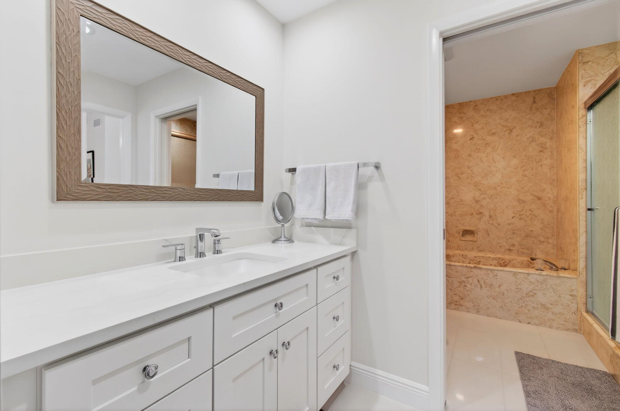 7727 La Mirada Drive Boca Raton, FL 33433 - Photo 44 of 91 a bathroom with a double vanity sink and mirror