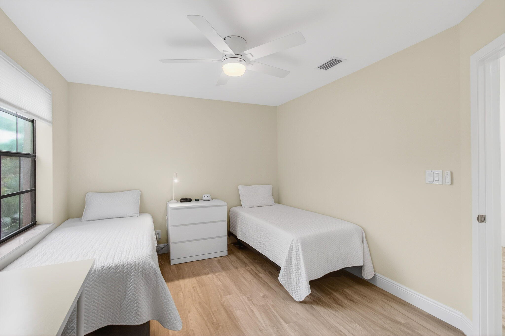 7727 La Mirada Drive Boca Raton, FL 33433 - Photo 48 of 91 a bedroom with a bed and a ceiling fan