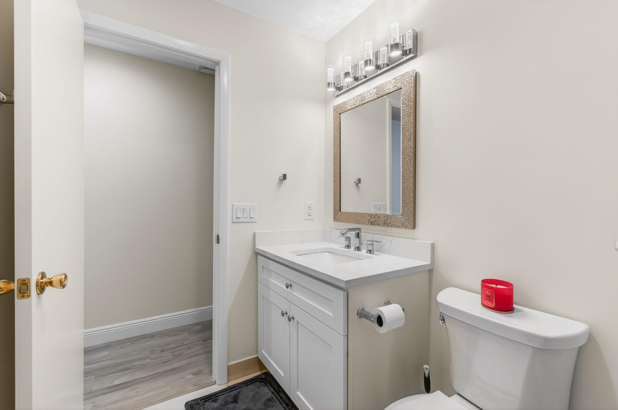 7727 La Mirada Drive Boca Raton, FL 33433 - Photo 52 of 91 a bathroom with a toilet sink and mirror