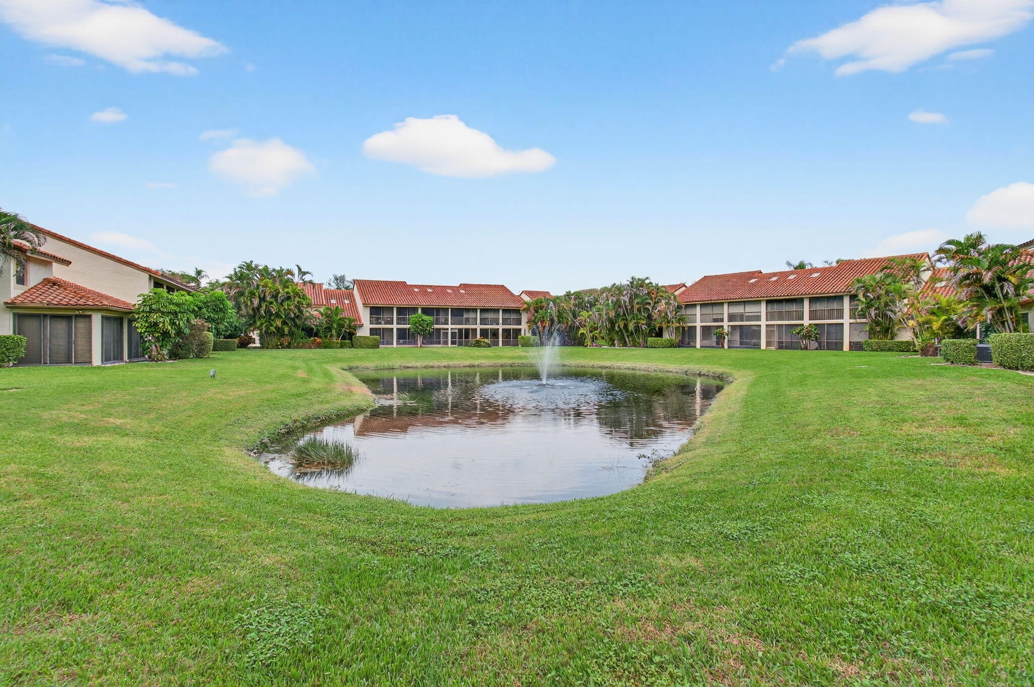 7727 La Mirada Drive Boca Raton, FL 33433 - Photo 65 of 91 a swimming pool with outdoor seating and yard