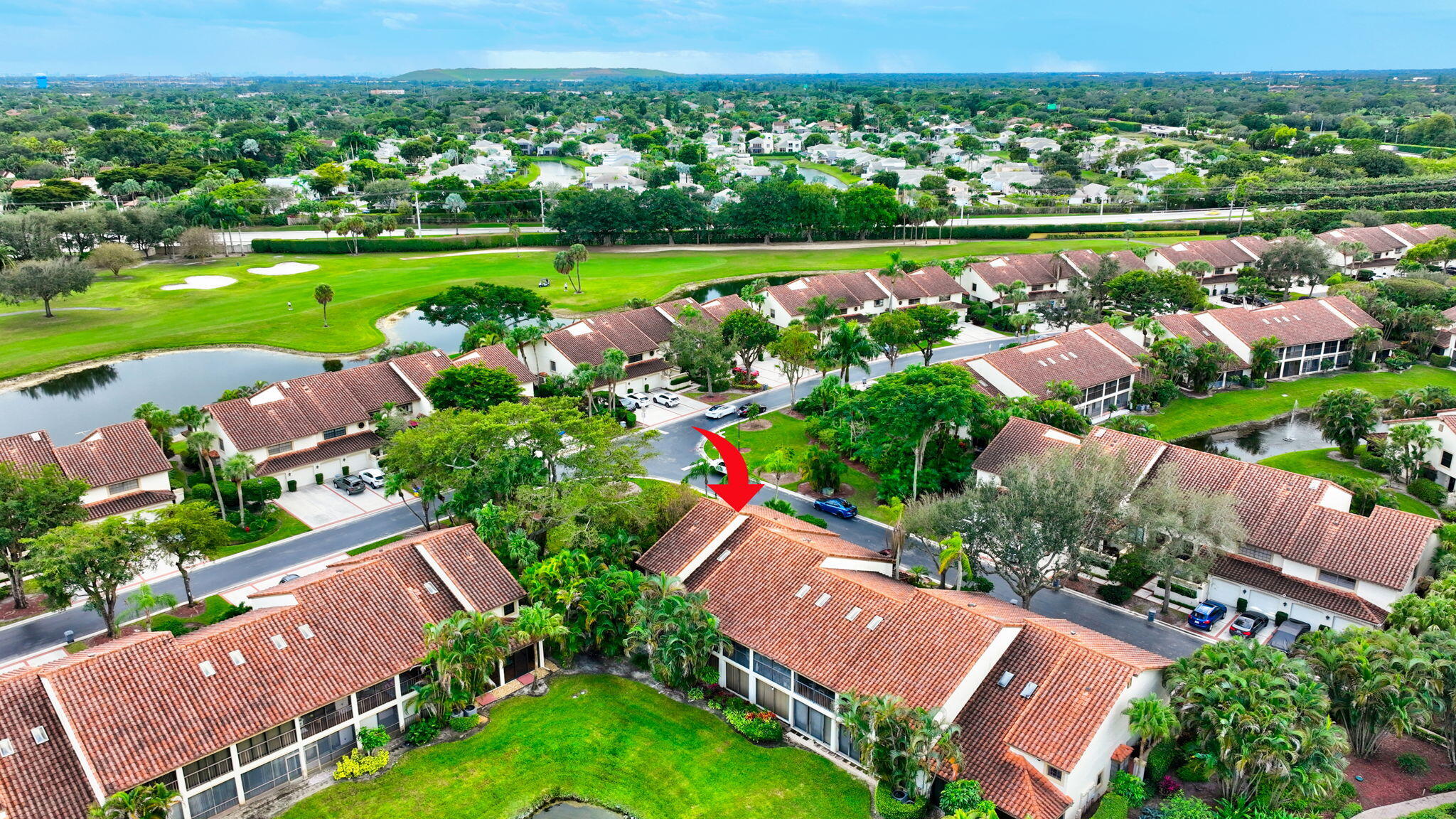 7727 La Mirada Drive Boca Raton, FL 33433 - Photo 89 of 91 an aerial view of a houses with a garden and lake view
