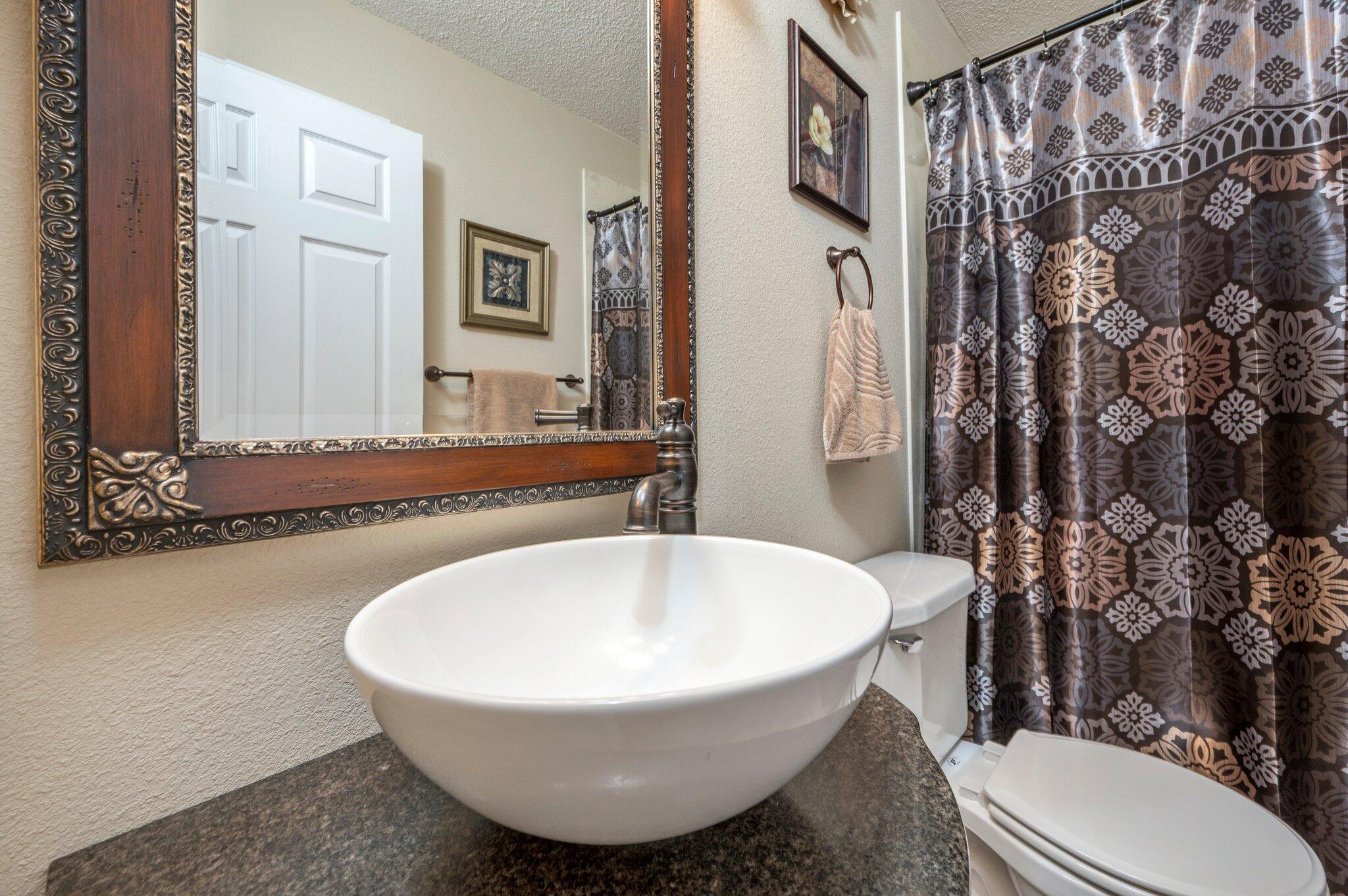1084 Reeves Road Baker, FL 32531 - Photo 13 of 37 a bathroom with a sink and toilet