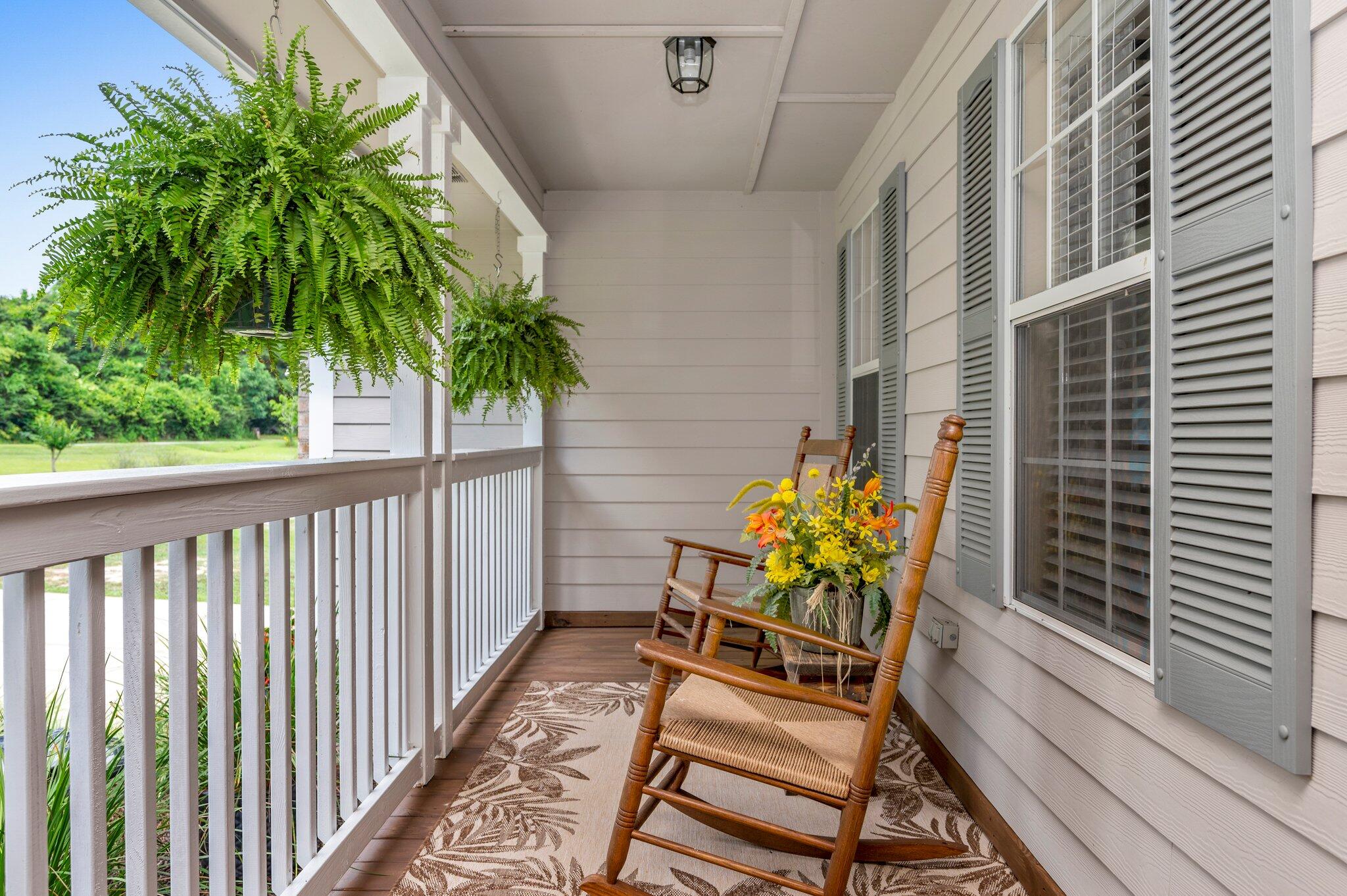 1084 Reeves Road Baker, FL 32531 - Photo 3 of 37 a view of two chairs in patio of the house