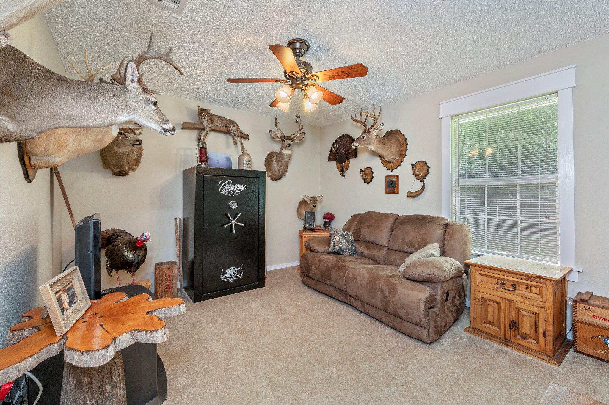 1084 Reeves Road Baker, FL 32531 - Photo 10 of 37 a living room with furniture and decor