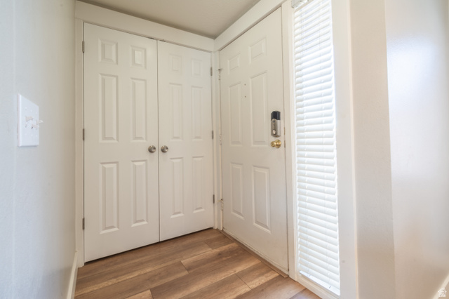 860 South Village Road, Unit Y8 St. George, UT 84770 - Photo 14 of 29 Entryway featuring wood finished floors