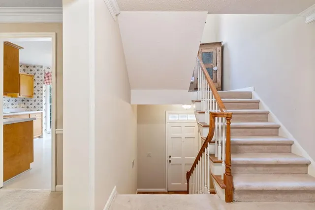 a view of entryway with wooden floor