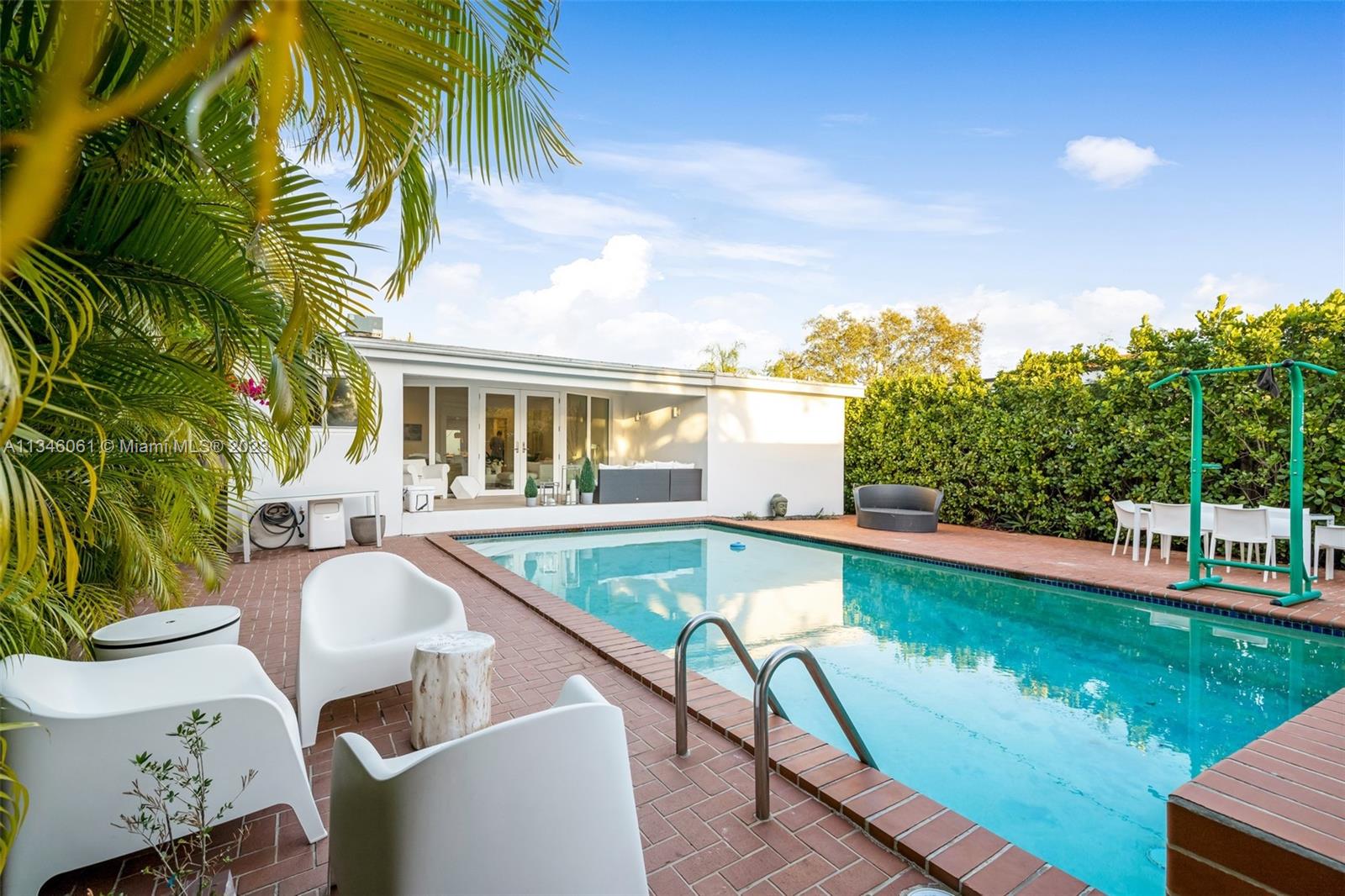 730 Southwest 26th Road Miami, FL 33129 - Photo 21 of 34 a view of a patio with swimming pool