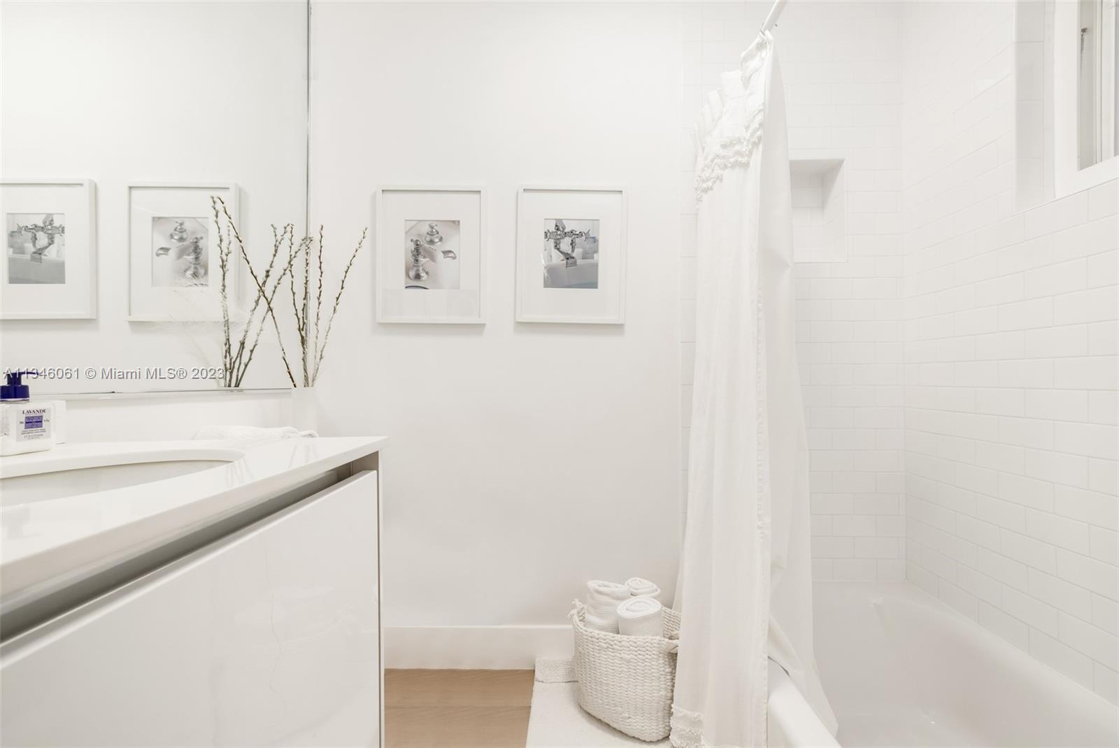 730 Southwest 26th Road Miami, FL 33129 - Photo 34 of 34 a bathroom with a sink a toilet and mirror