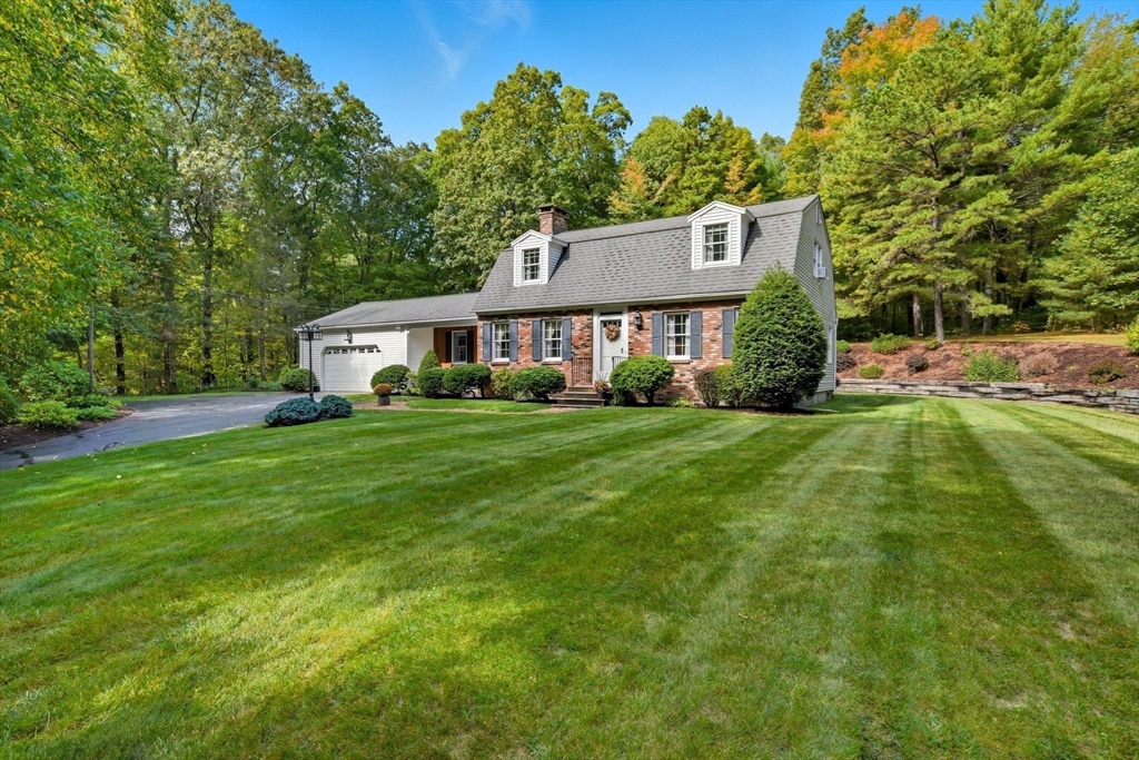 201 Belchertown Road Ware, MA 01082 - Photo 1 of 42 a house view with a garden space