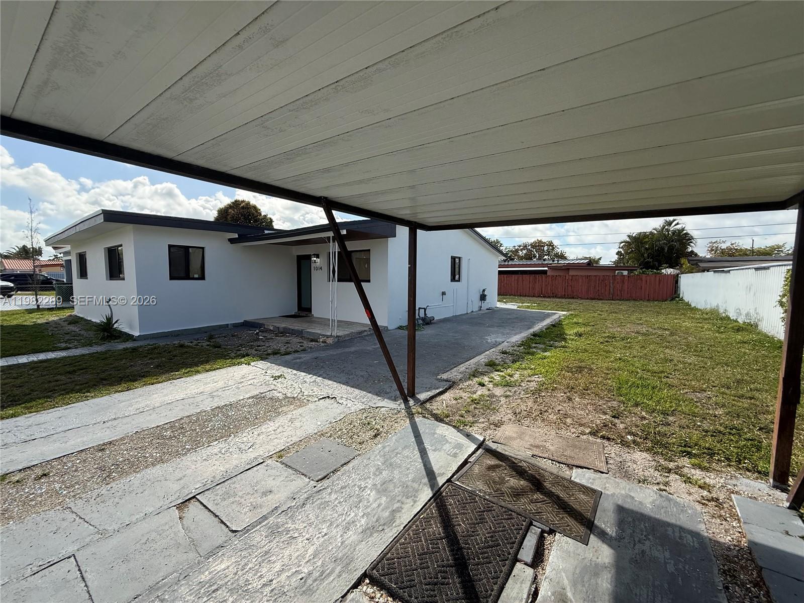 1014 West 66th Street Hialeah, FL 33012 - Photo 13 of 43 a view of a backyard