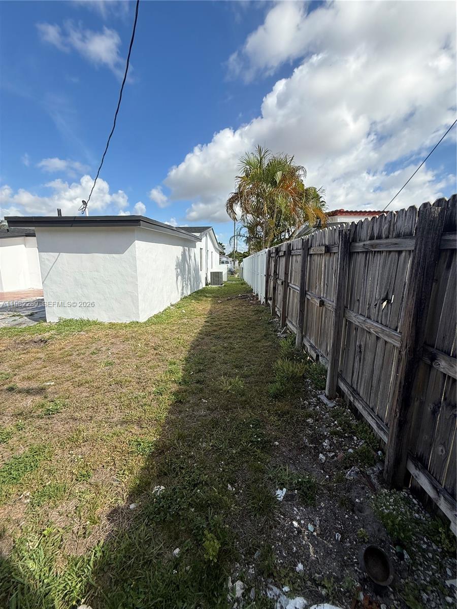 1014 West 66th Street Hialeah, FL 33012 - Photo 18 of 43 a view of a backyard of the house