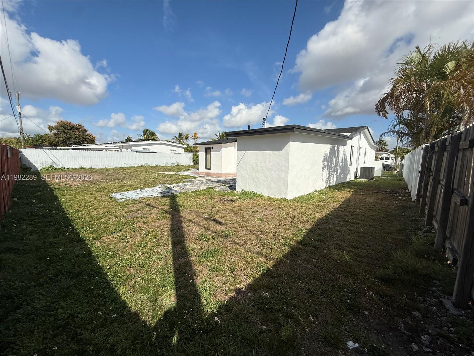 1014 West 66th Street Hialeah, FL 33012 - Photo 20 of 43 a view of a terrace with a yard
