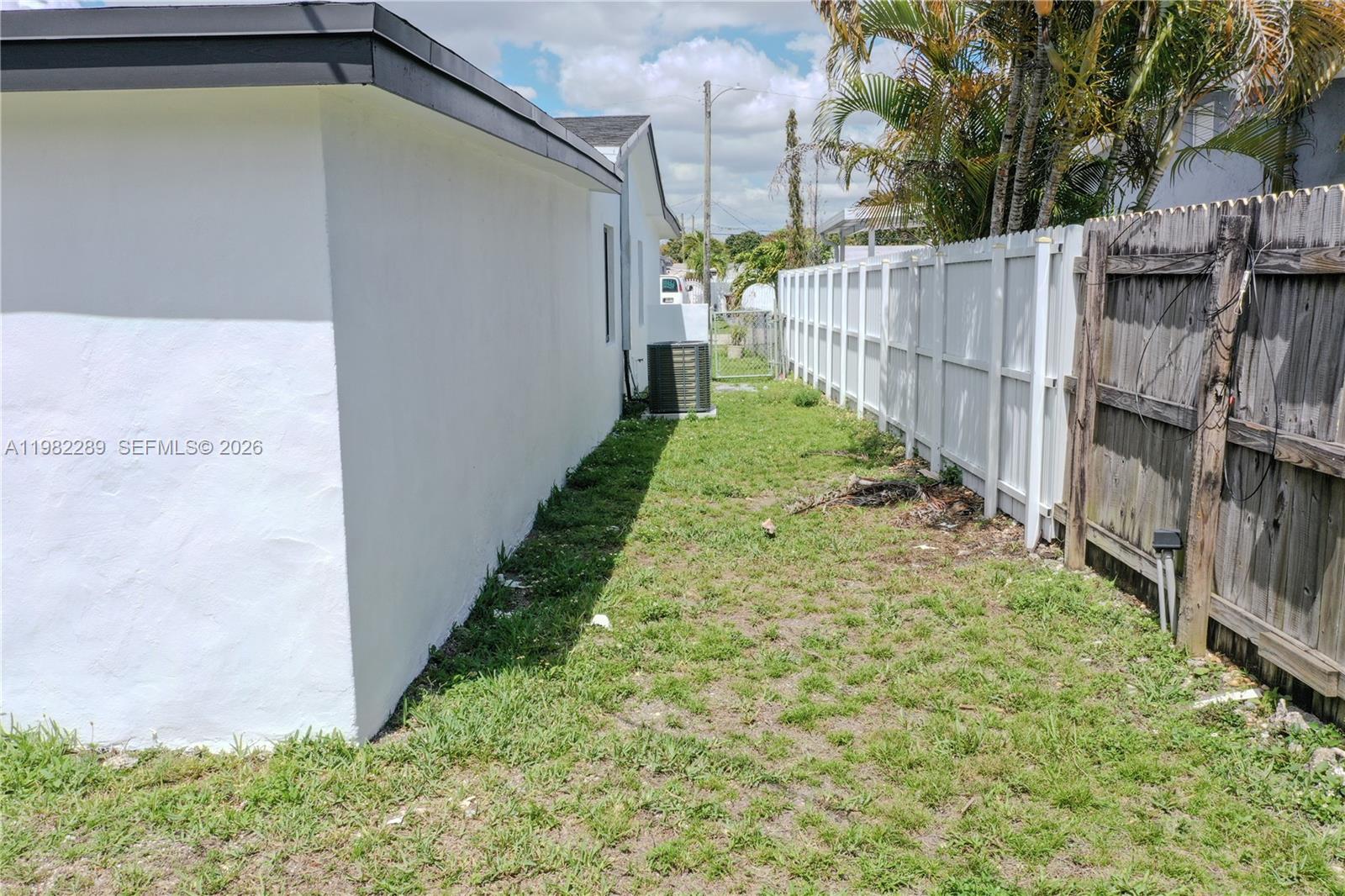 1014 West 66th Street Hialeah, FL 33012 - Photo 43 of 43 a view of a backyard with pathway