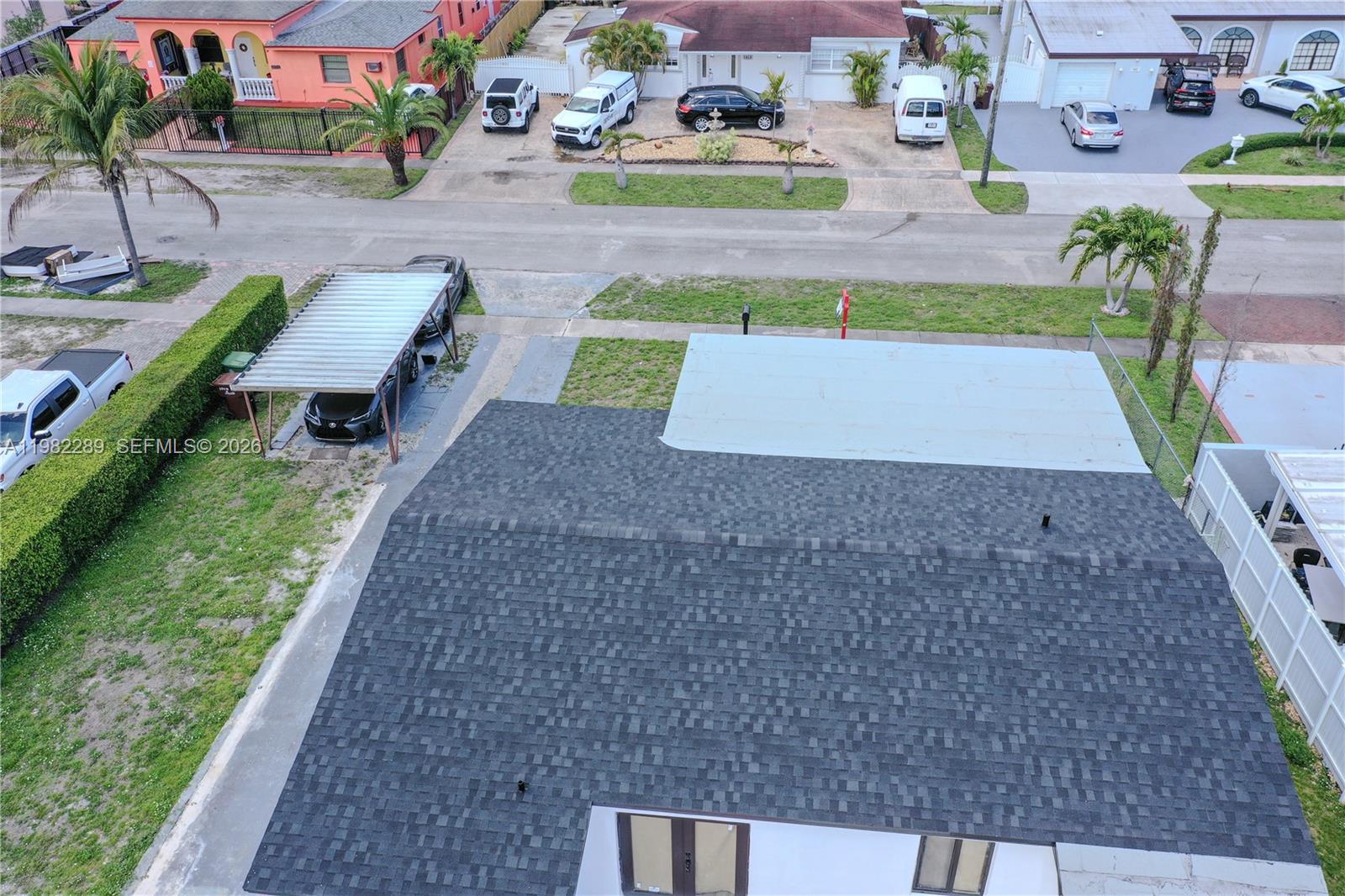 1014 West 66th Street Hialeah, FL 33012 - Photo 7 of 43 an aerial view of a house with a yard