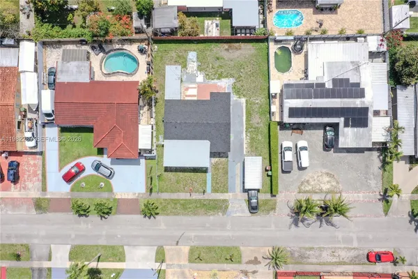 an aerial view of multi story residential apartment building