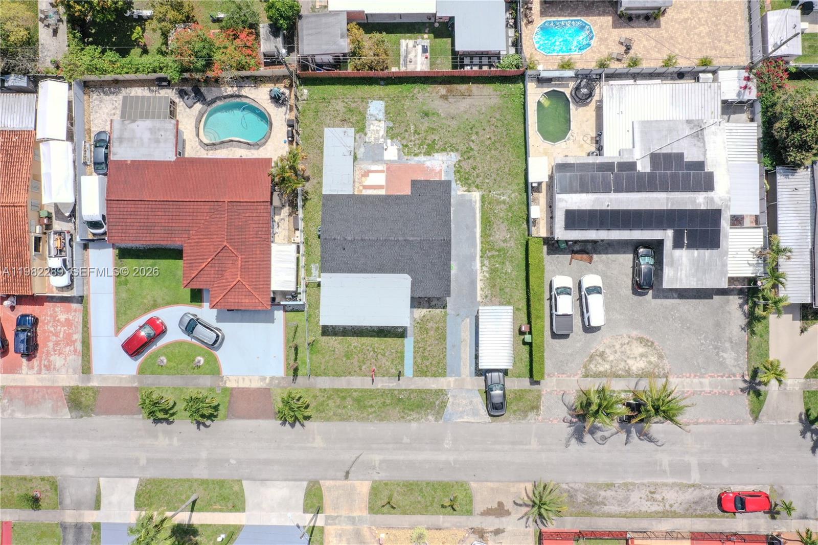 1014 West 66th Street Hialeah, FL 33012 - Photo 8 of 43 an aerial view of multi story residential apartment building