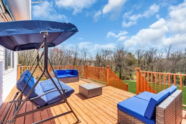 a view of a two chairs in the roof deck