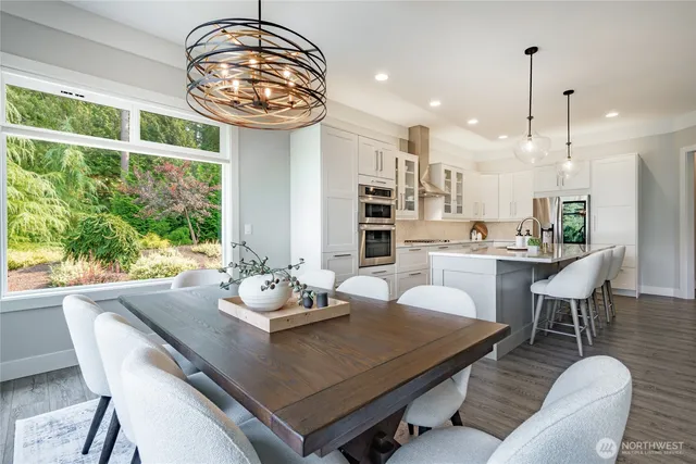 a view of a dining room with furniture window and outside view